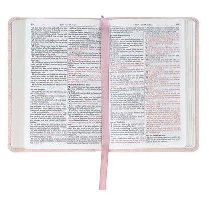 Mini KJV Bible with a pink faux leather cover