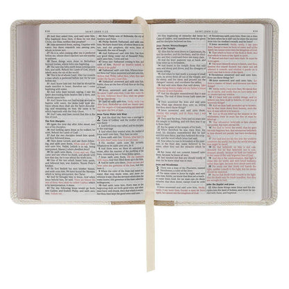 Mini KJV Bible with a white faux leather cover