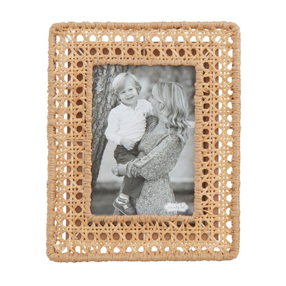 Large picture frame wrapped in natural woven cane