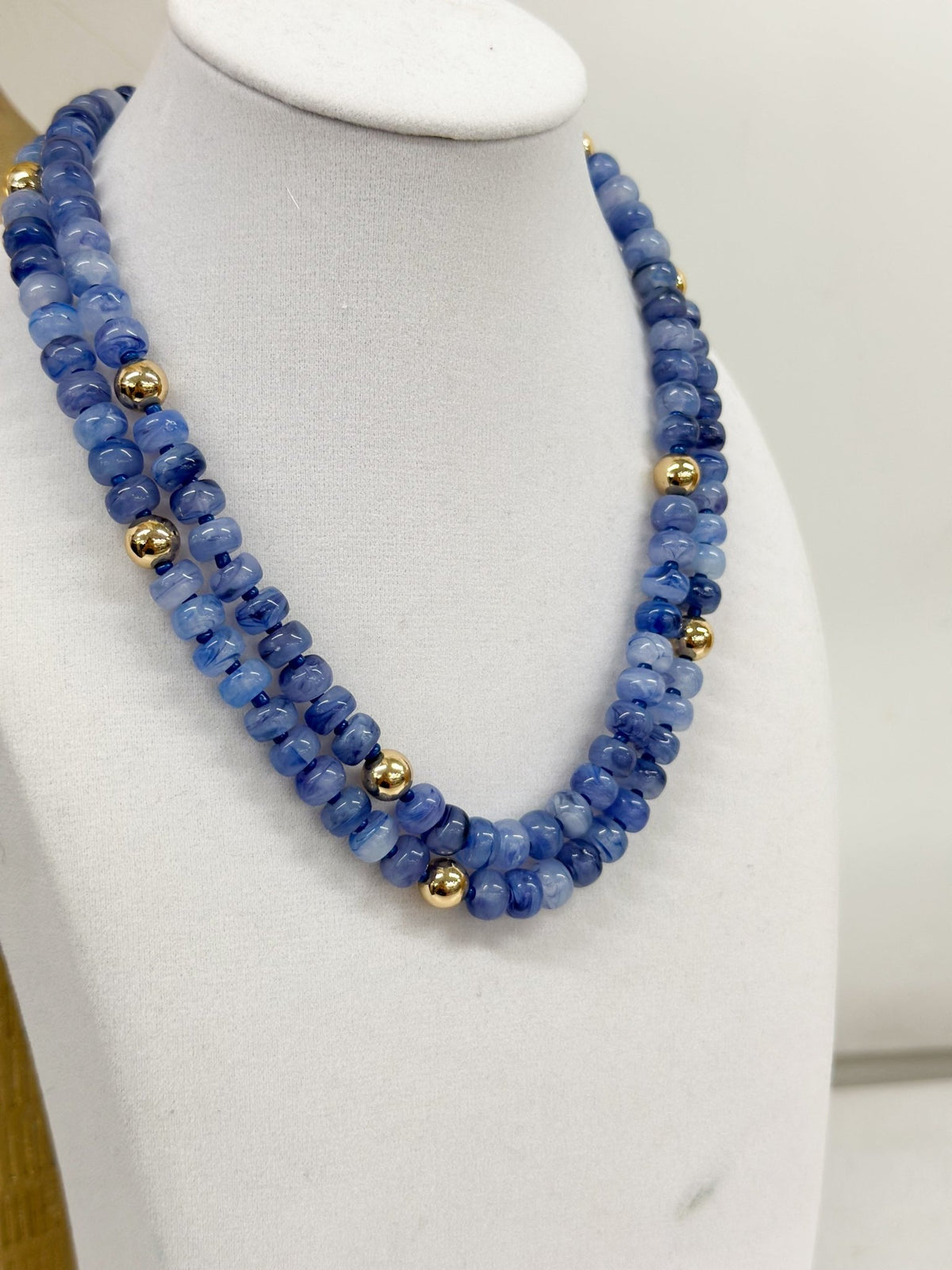 Marble beads layered into a short choker necklace