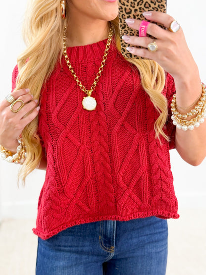 Dark red sweater tee with a soft knit texture