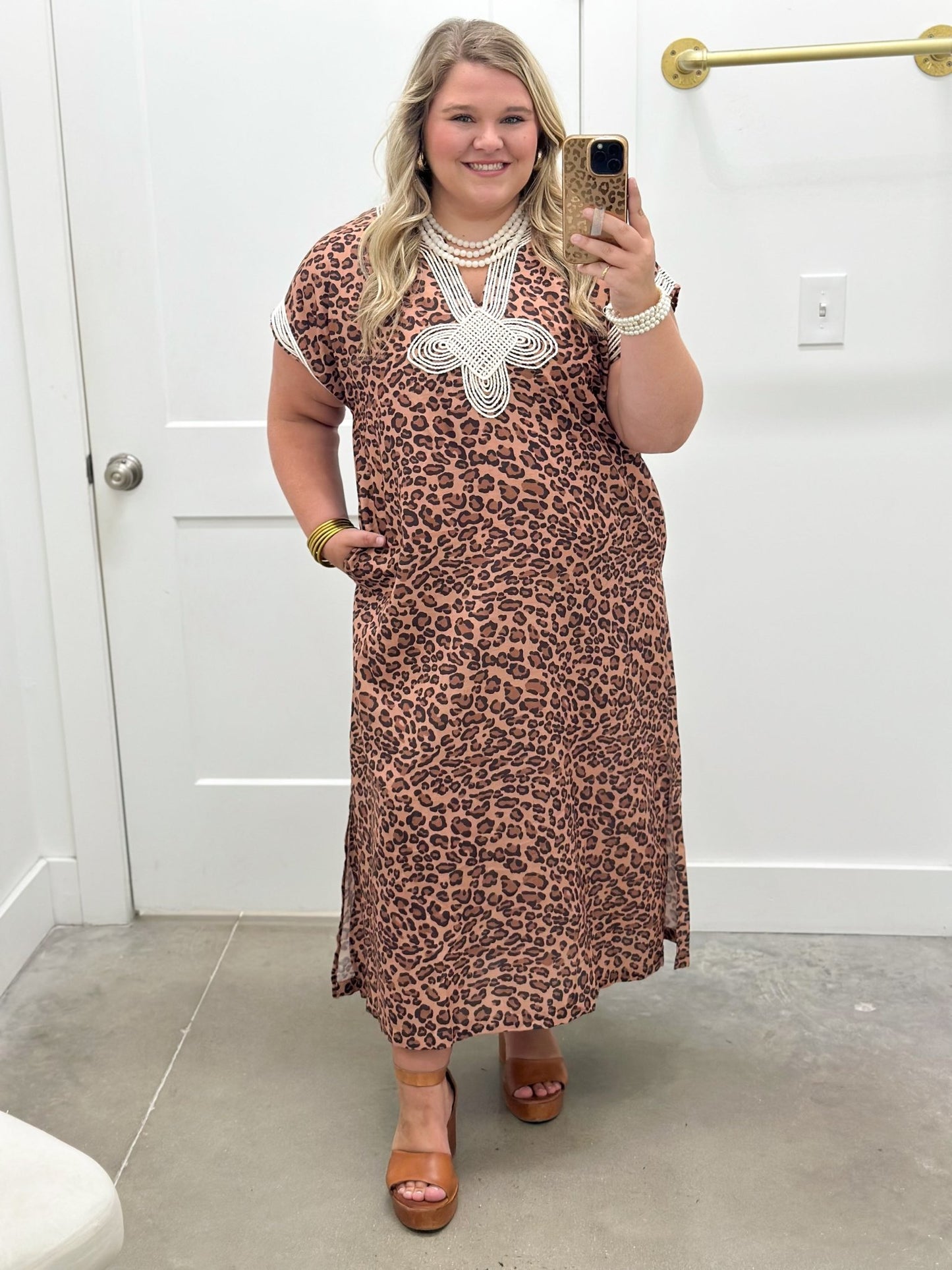 Leopard print dress falling to a midi length