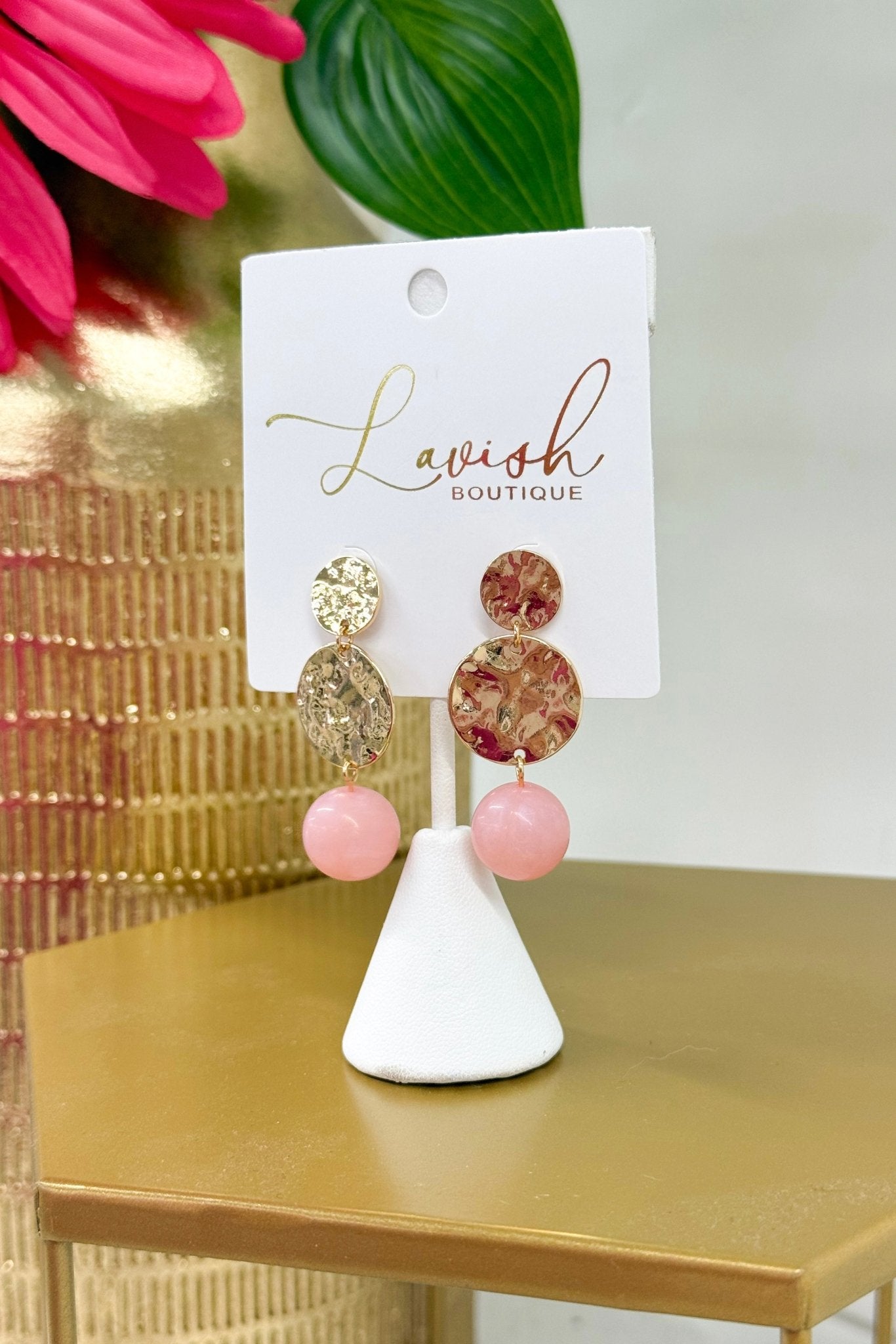 Hammered disc earrings in light pink with a bead drop
