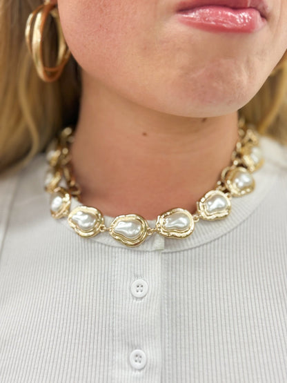 Cream pearl necklace with linked pearl stations