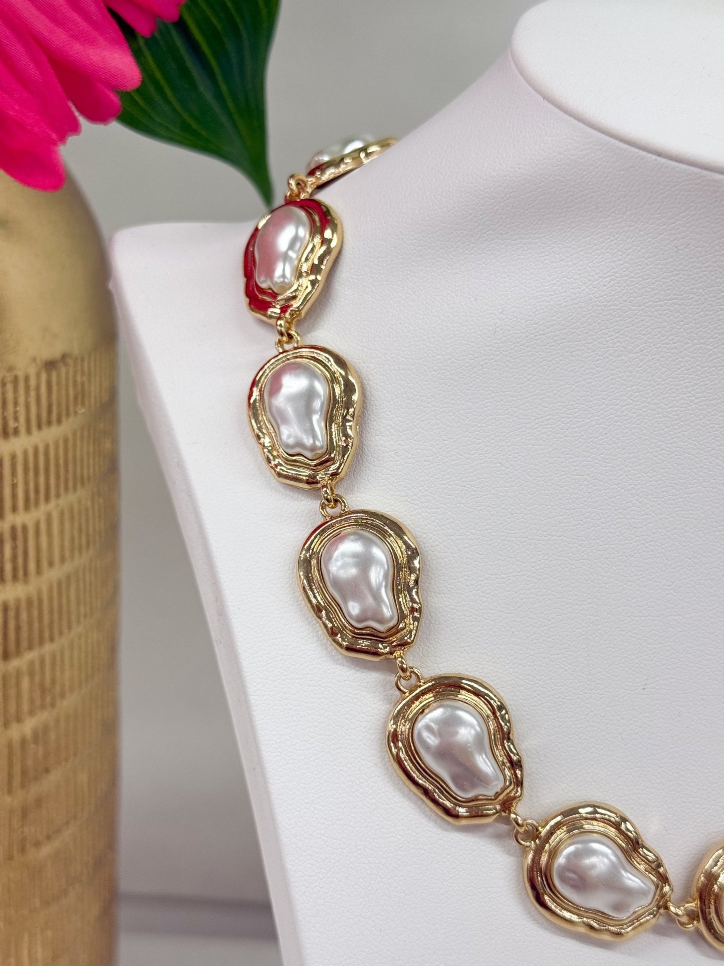 Irregular baroque pearls joined with gold-tone links