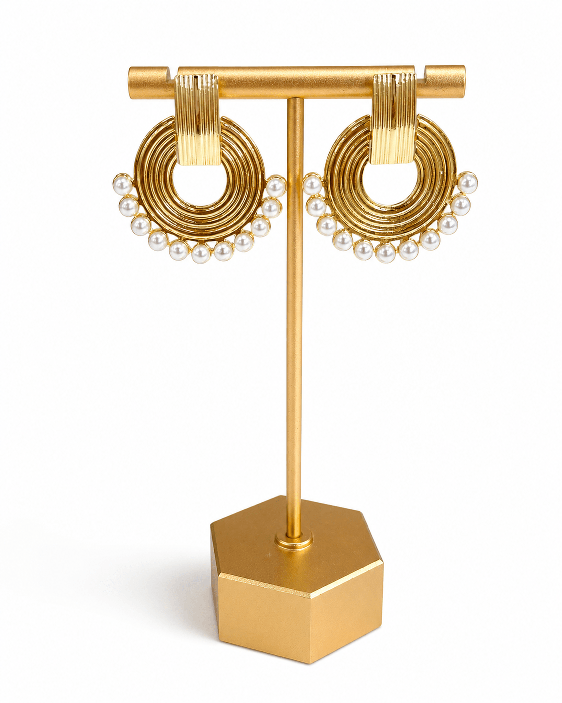 Pearl drop earrings on a gold-tone post