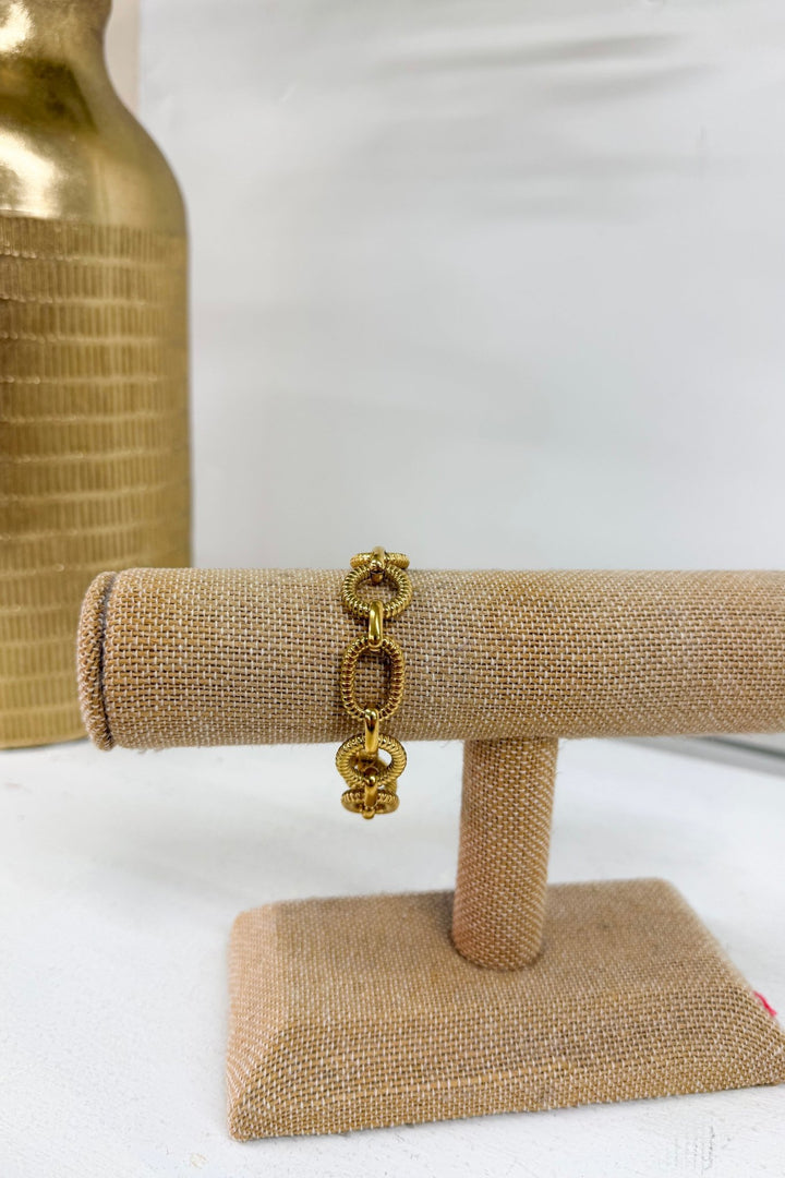Gold bracelet with a heart charm