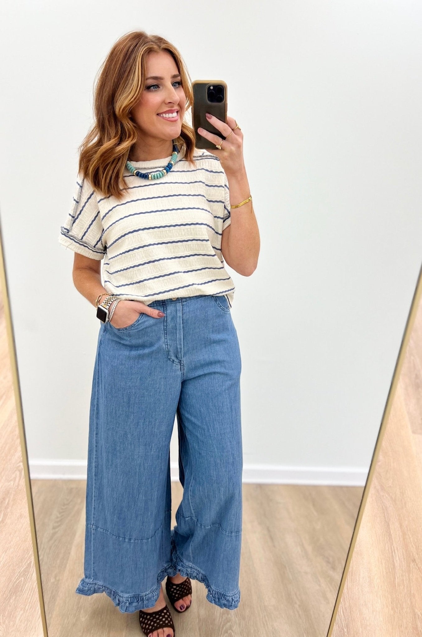 Denim toned stripe top with a round neckline
