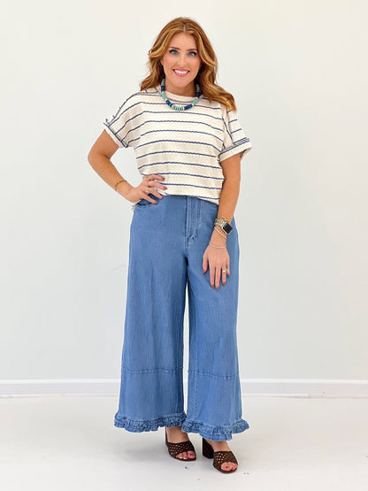 Striped top with a raised texture and short sleeves