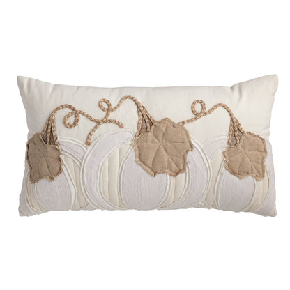 Cream and tan lumbar pillow with an appliqued pumpkin