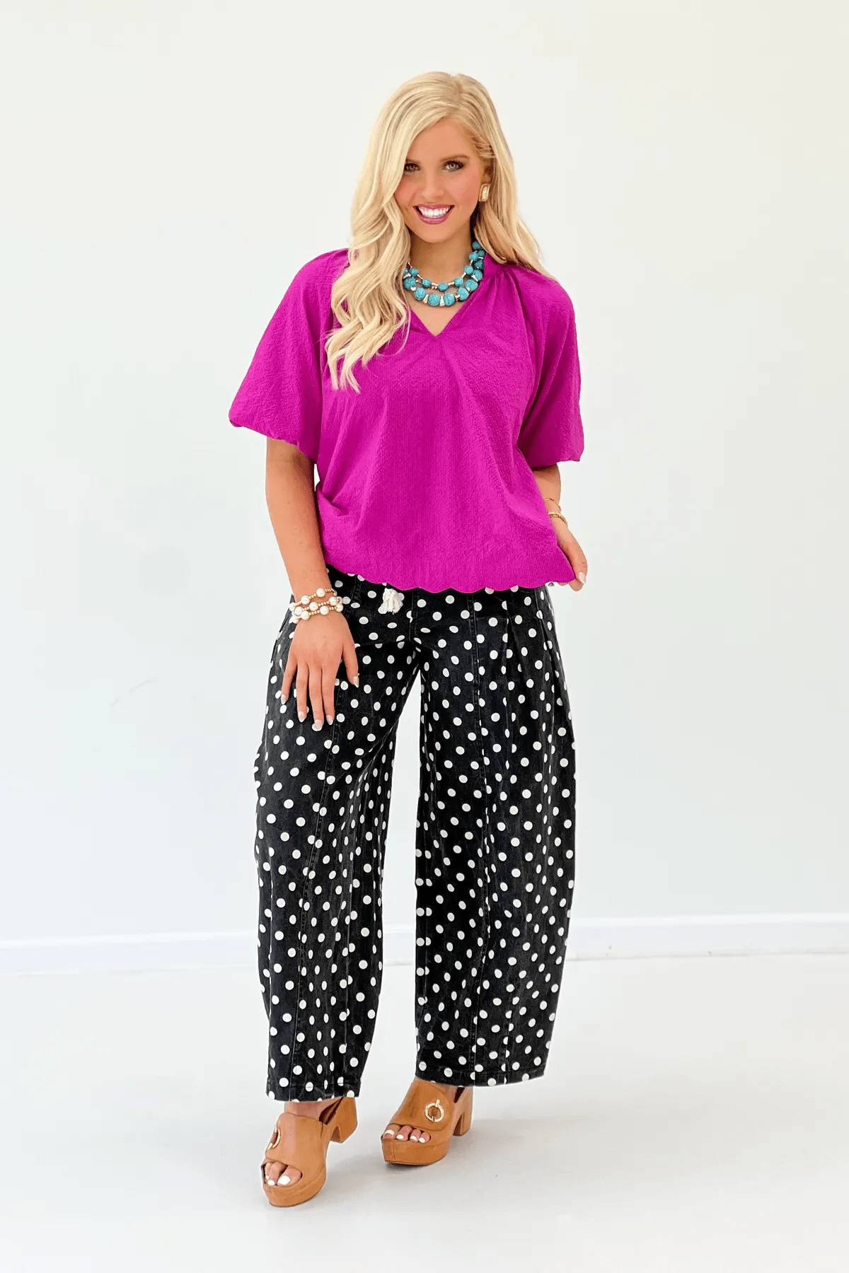 Bubble sleeve top in a vivid magenta