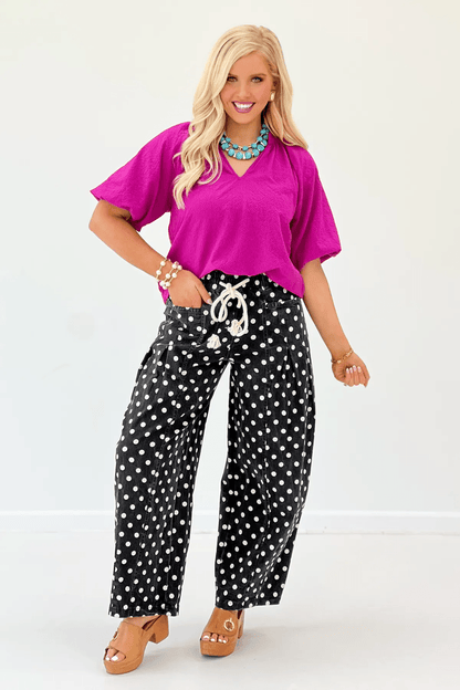 Bright magenta blouse with balloon sleeve volume