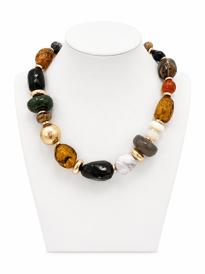 Multi-shaped marble stone links along a gold chain