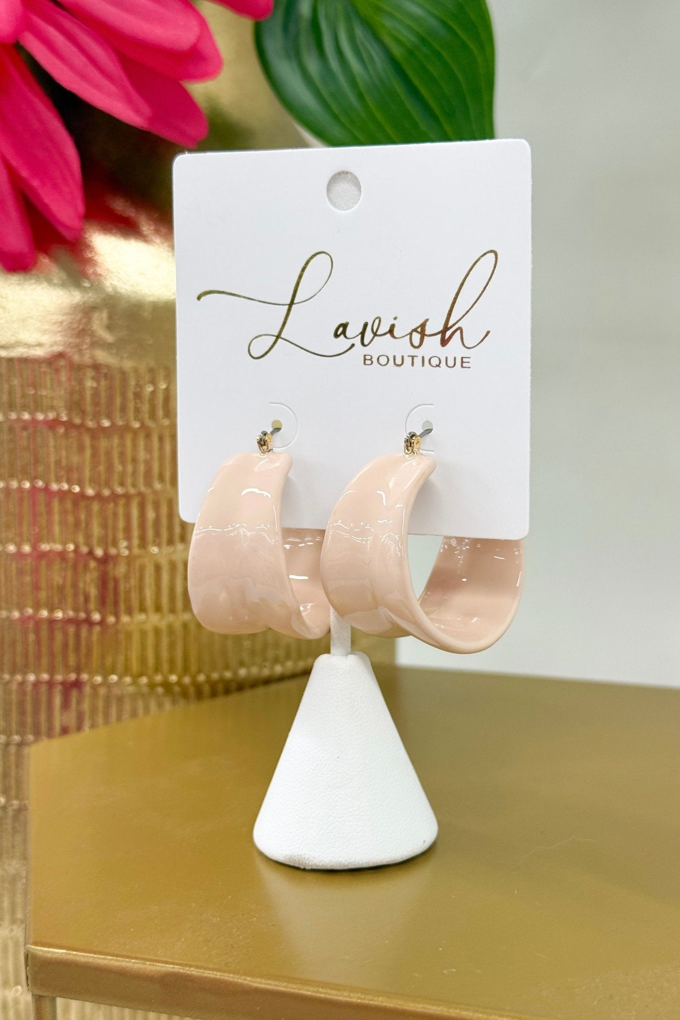 Broad hoops in a soft mauve finish