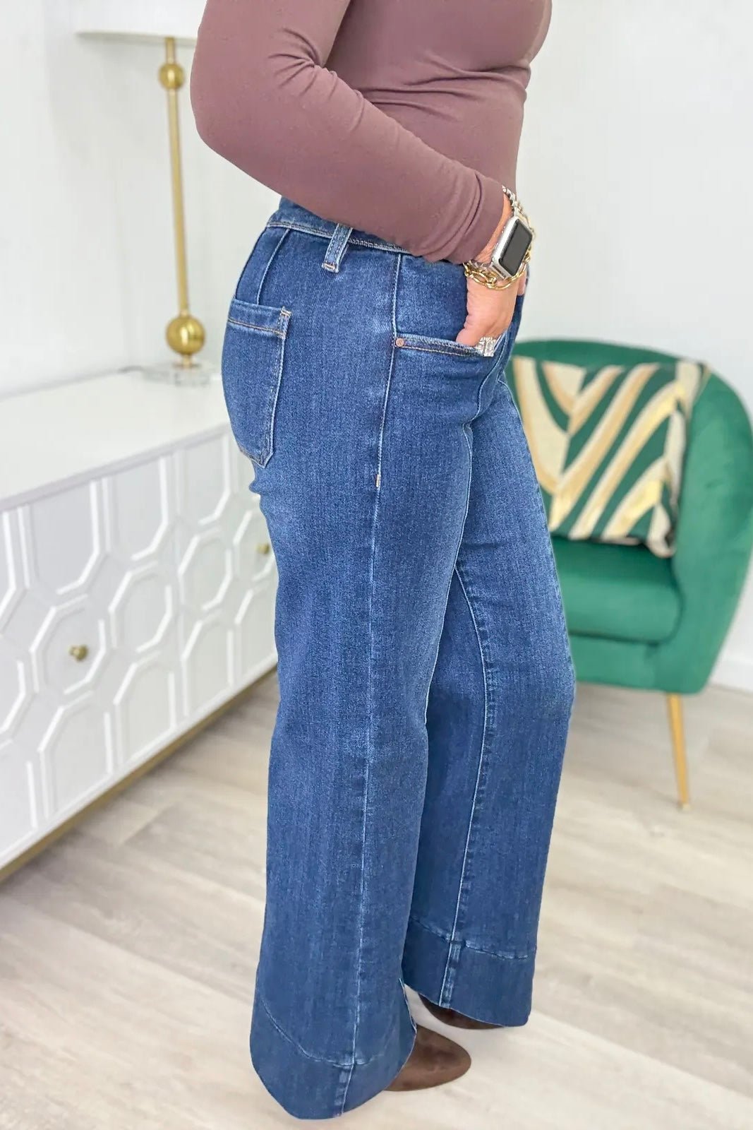 Wide flare jeans with a button and zip front