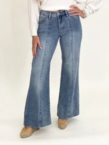 Mid rise flared denim with a full length hem