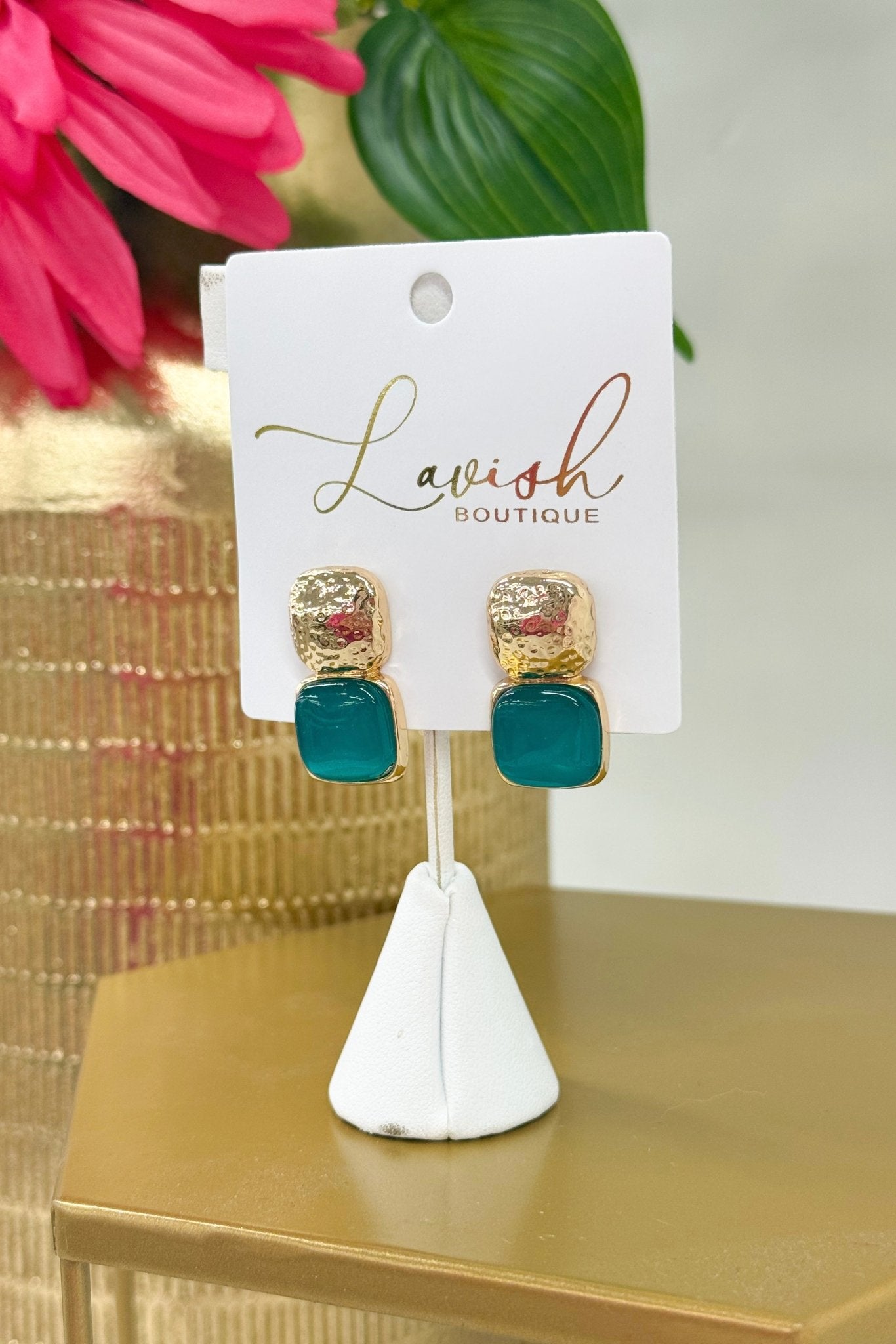 Mint cat eye stones set in chunky gold earrings