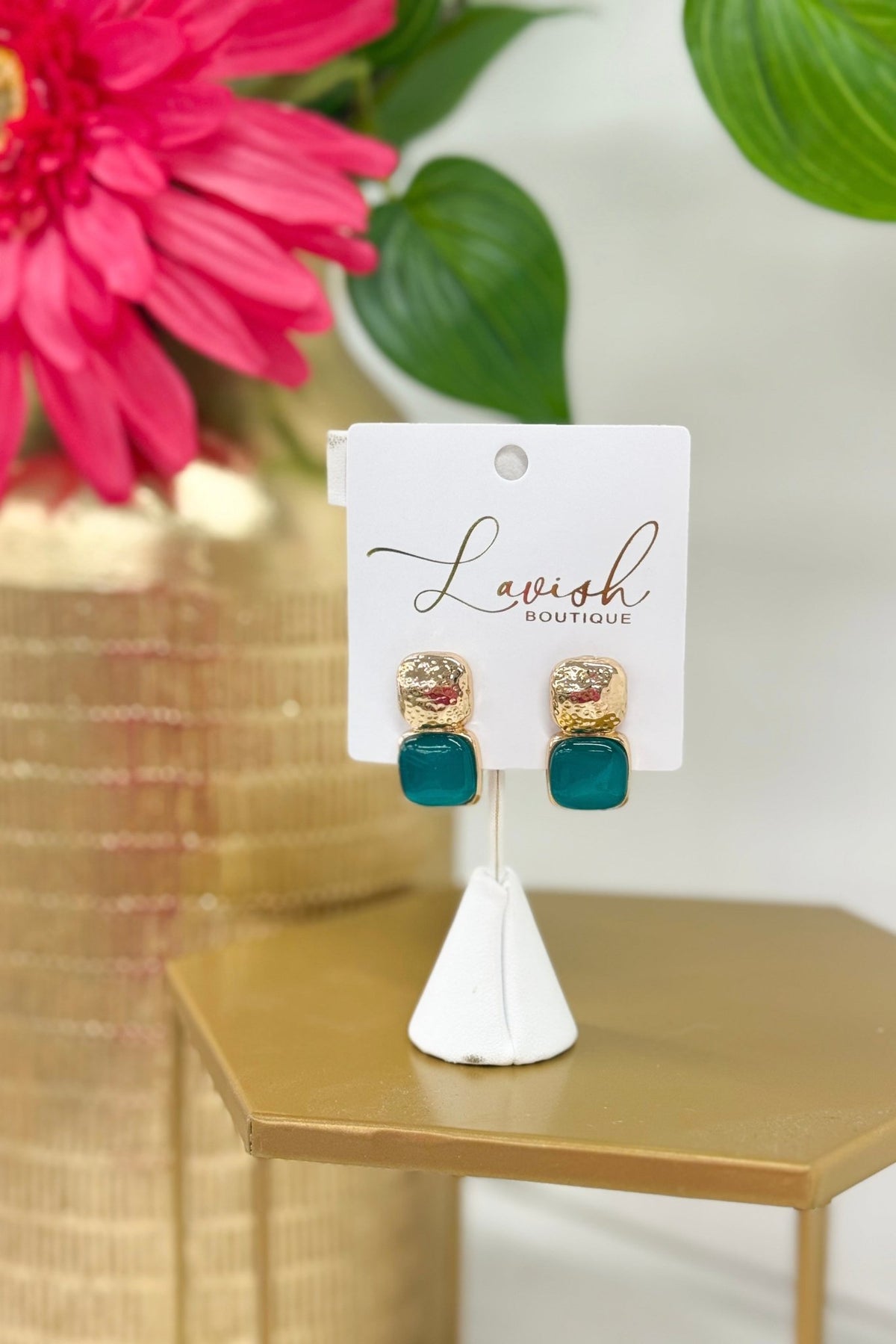 Bold mint green cat eye stone earrings with gold trim