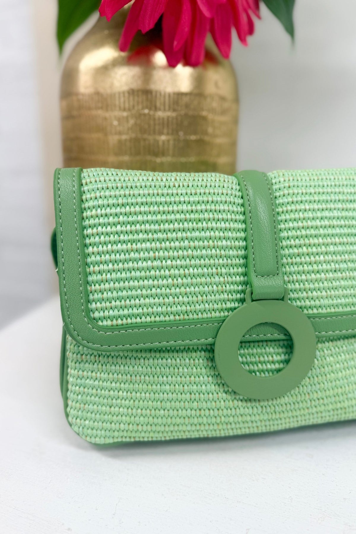 Woven straw crossbody bag in mint green