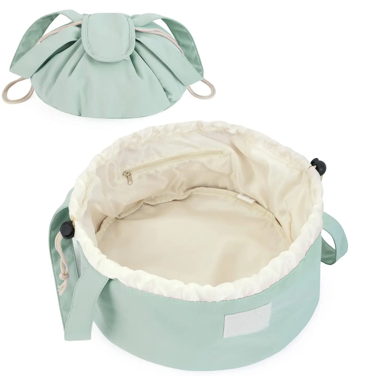 Mint green barrel makeup bag with drawstring closure, handles, and cream-lined interior