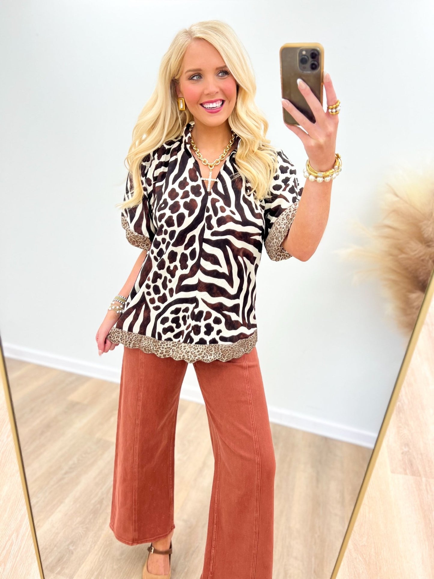 Rust toned washed stretch pants with a high rise waist
