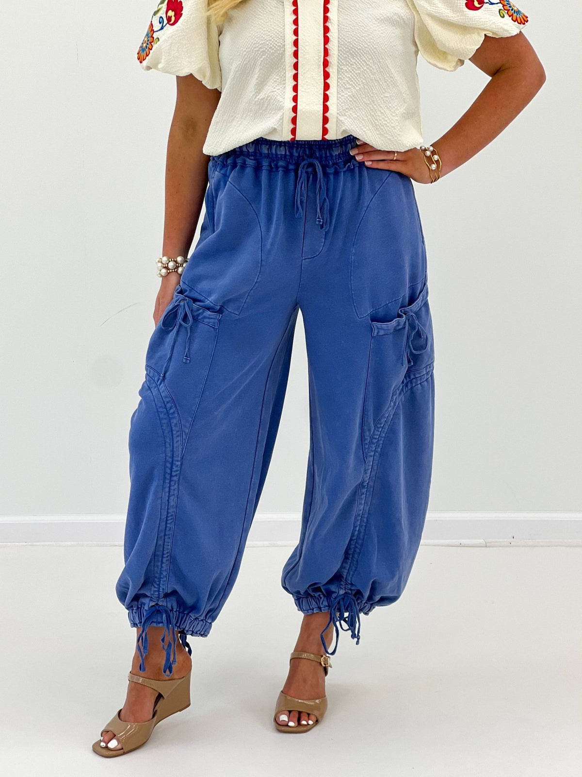Wide leg pants with a tie waist and front patch pockets