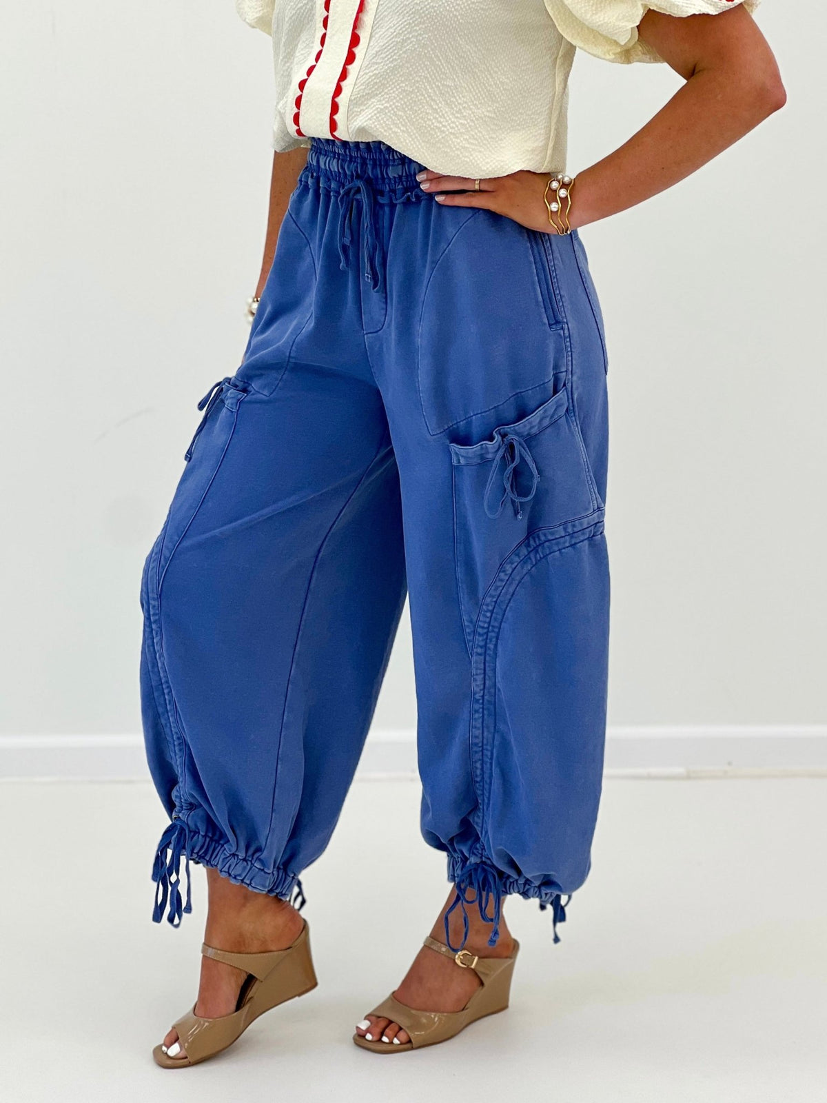 Wide leg pants with a tie belt and flat front pockets