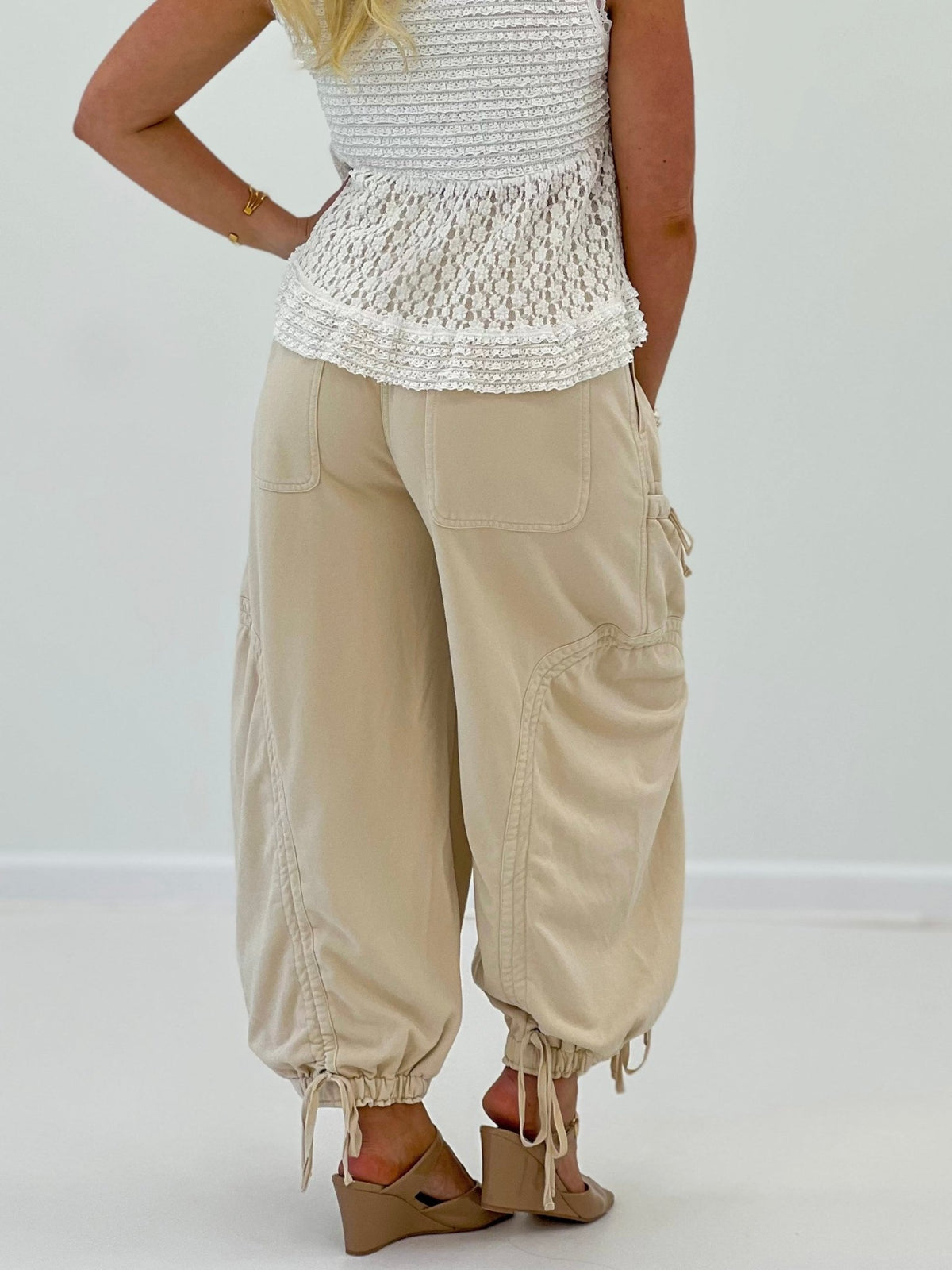 Front pocket wide leg pants with a drawstring tie waist