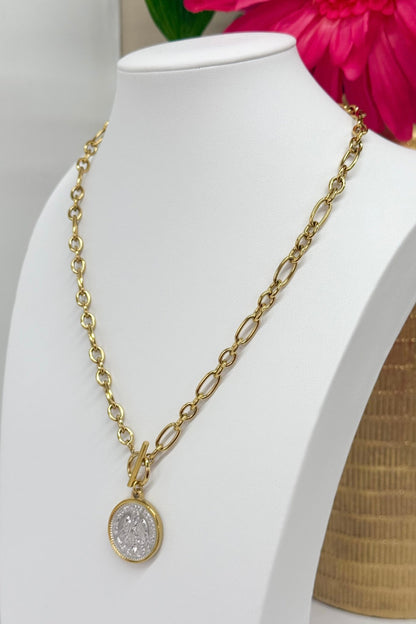 Round coin pendant in mixed gold and silver