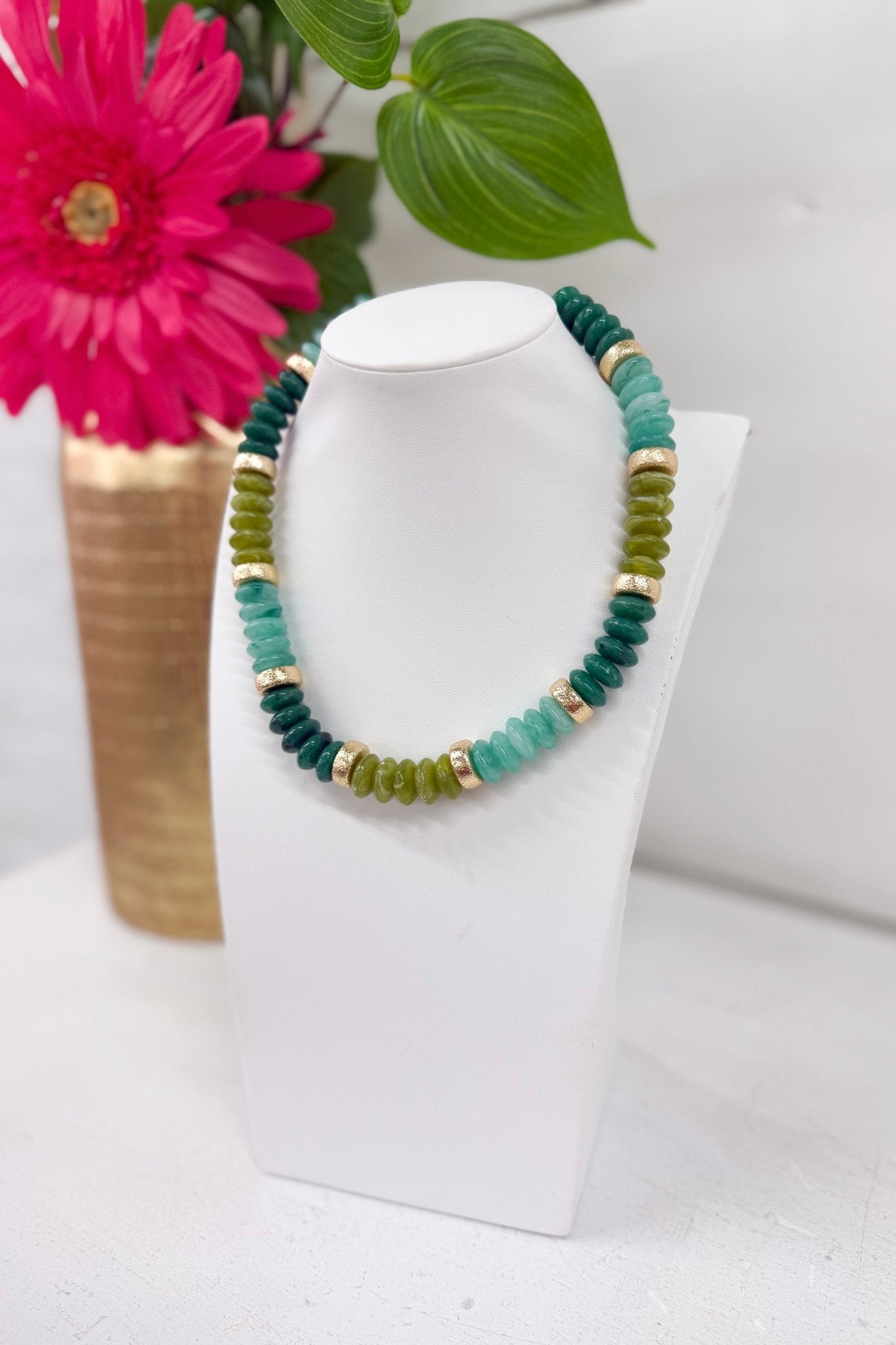 Green multi bead necklace with metallic spacers