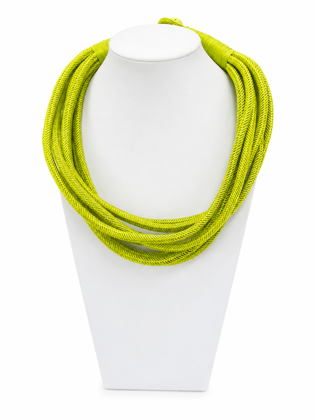 Several strands of lime green rope twisted into a necklace