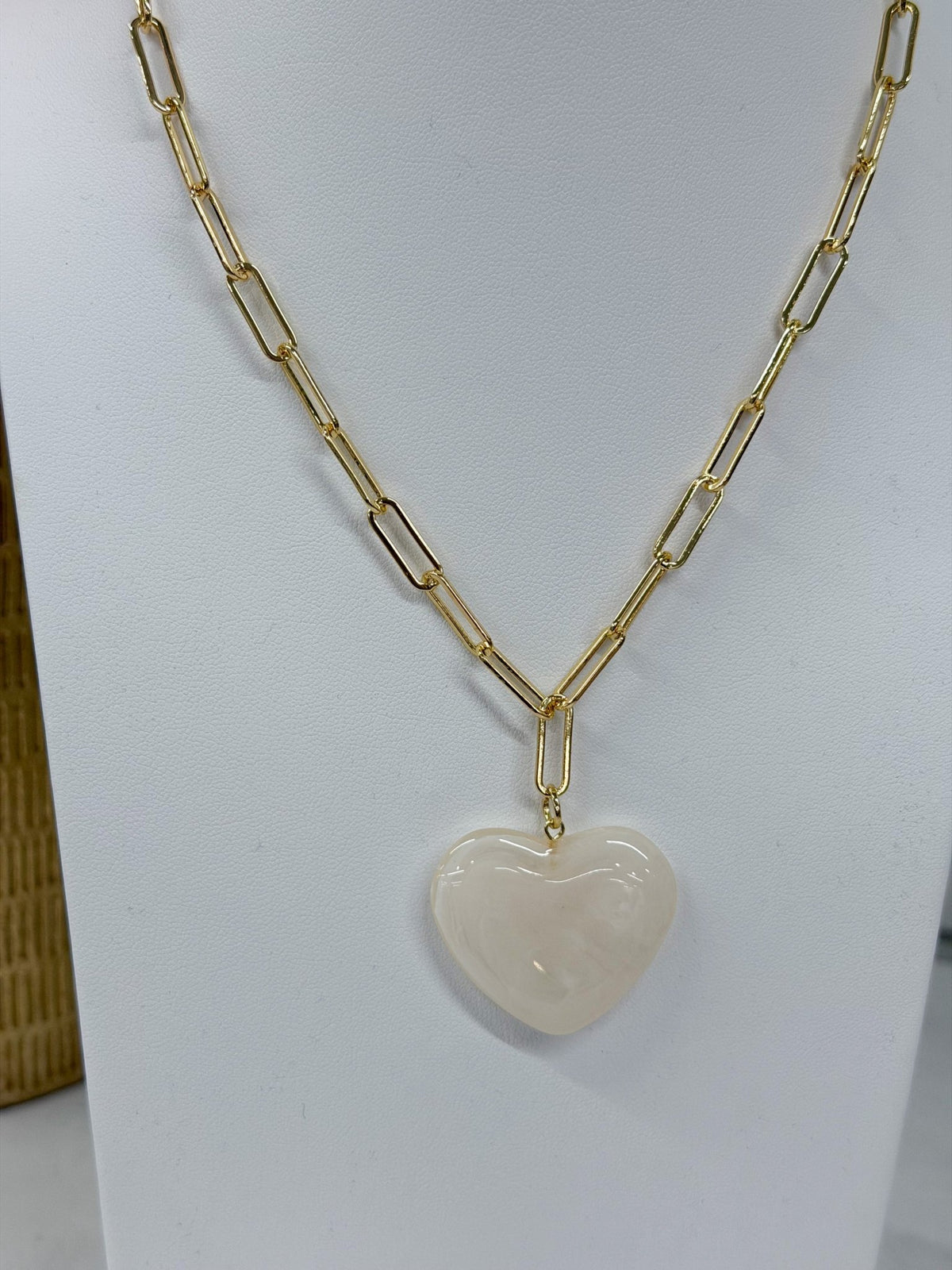 Heart charm necklace on a bold link chain