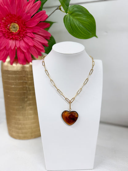 Heart pendant on an elongated paperclip chain