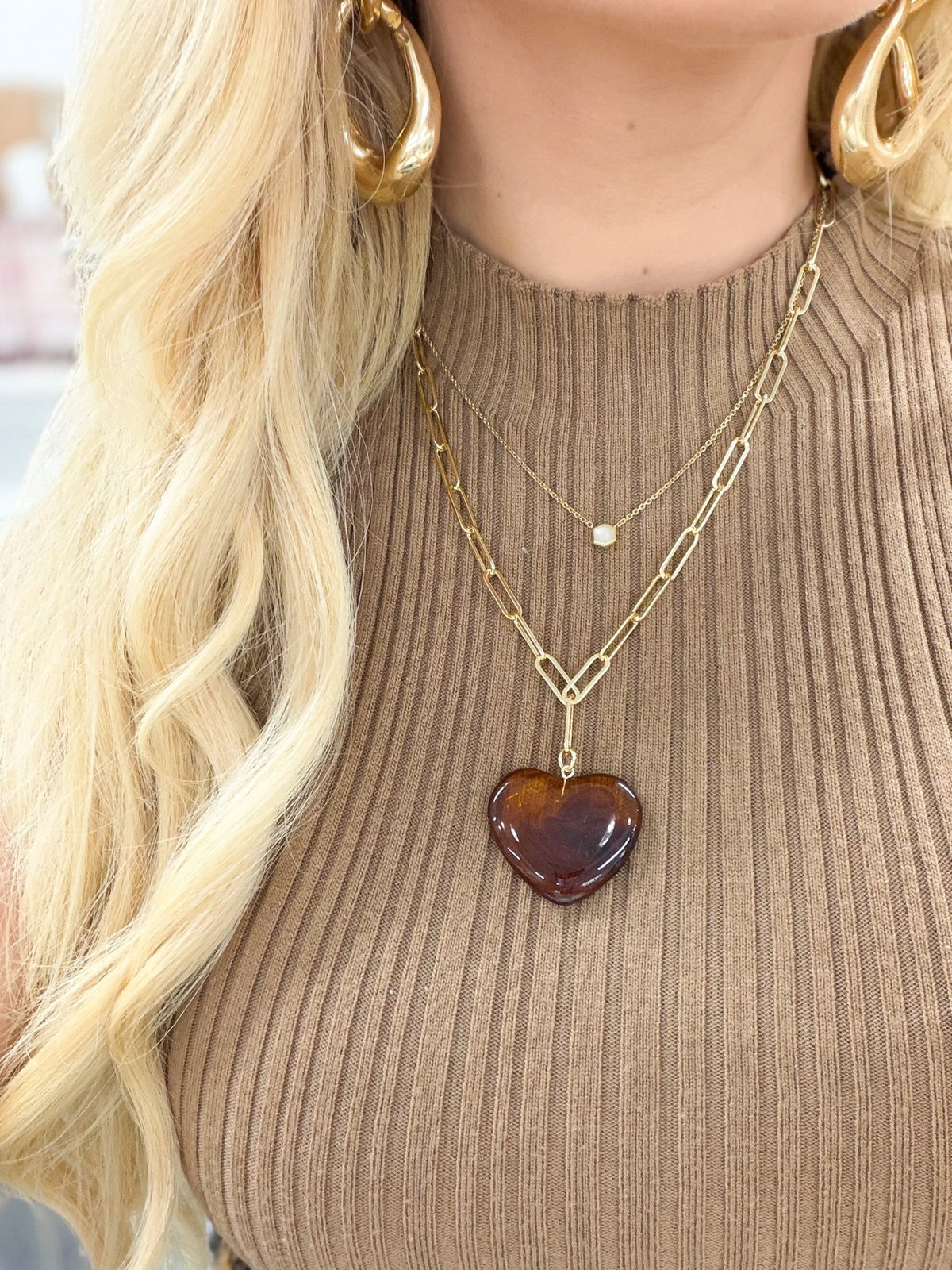 Paperclip link necklace with a single heart pendant