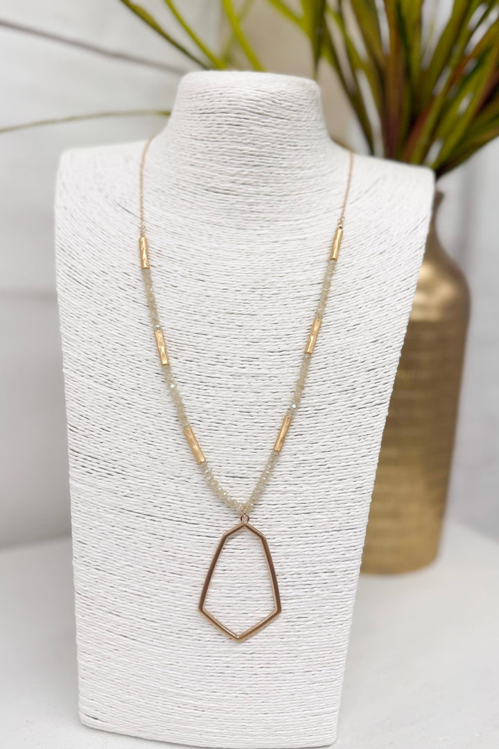 Natural toned beaded necklace with a hexagon pendant