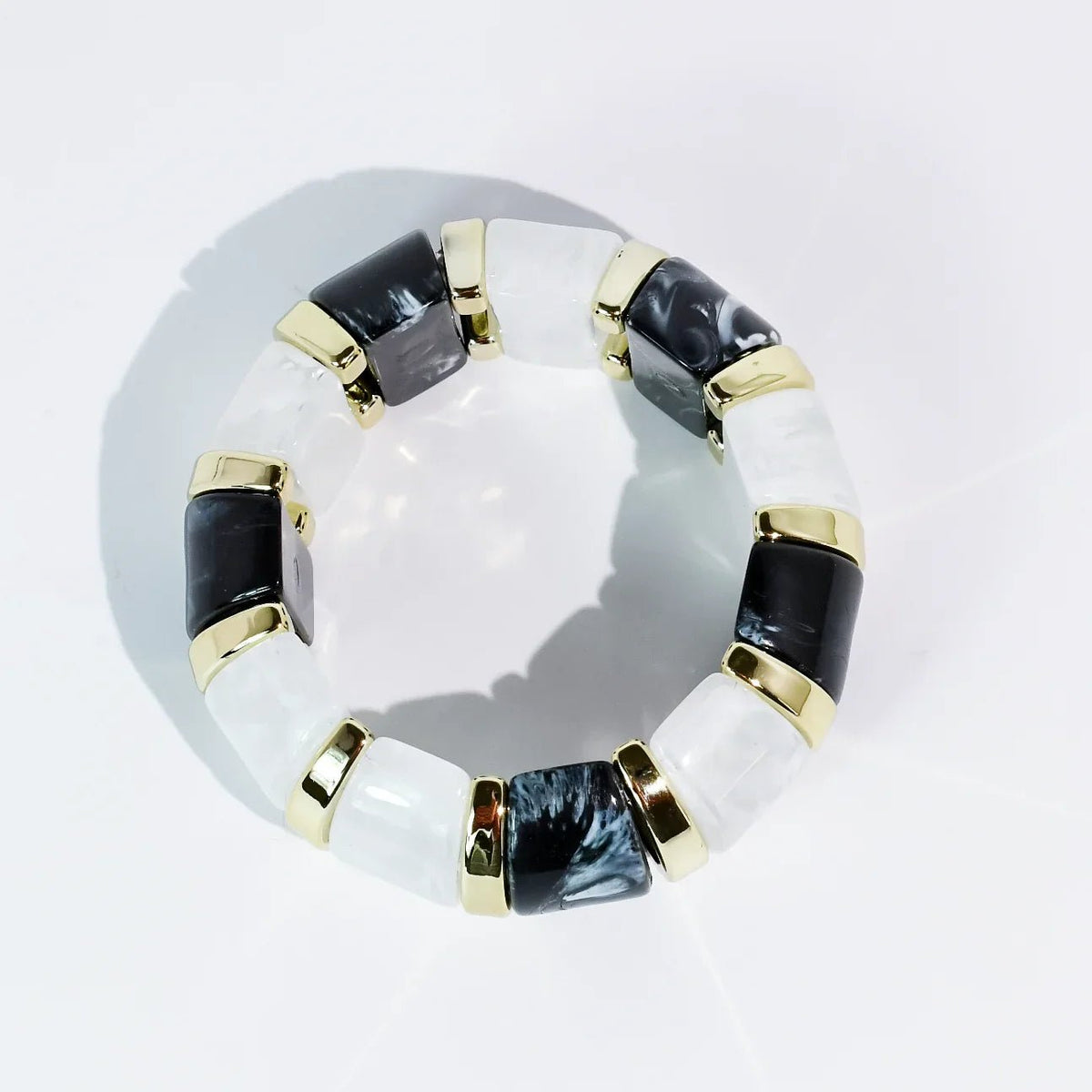 Black beaded bracelet with gold-tone accents
