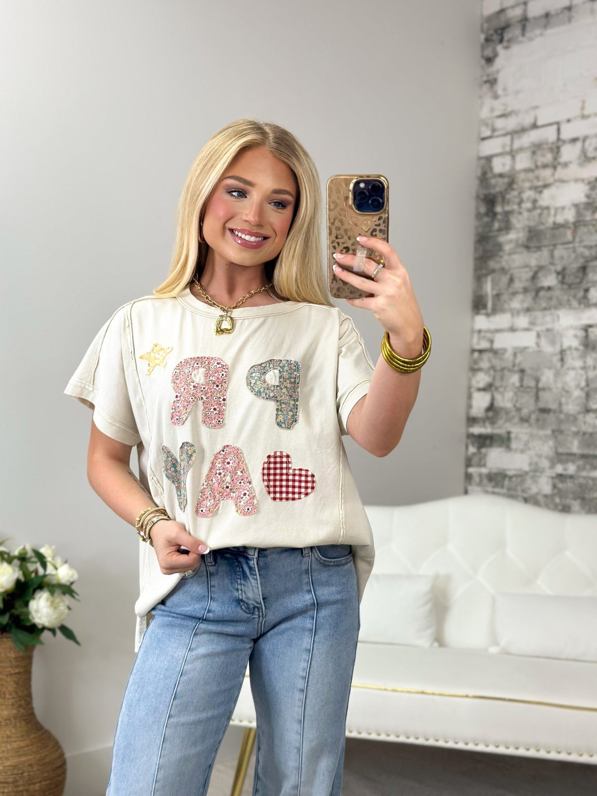 Short sleeve oat top with a chest graphic