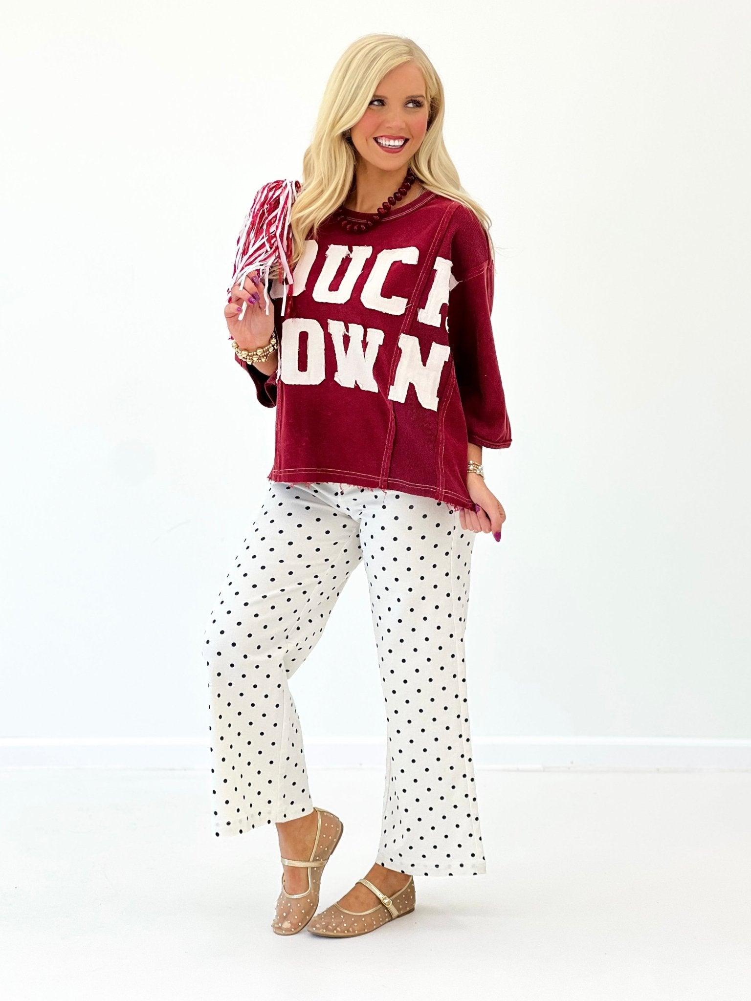 Oversized sweatshirt tee with a football themed graphic