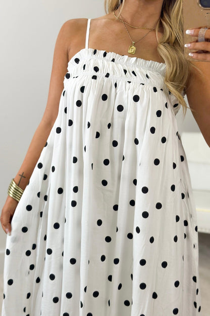 Off white maxi dress with a flowing plain skirt