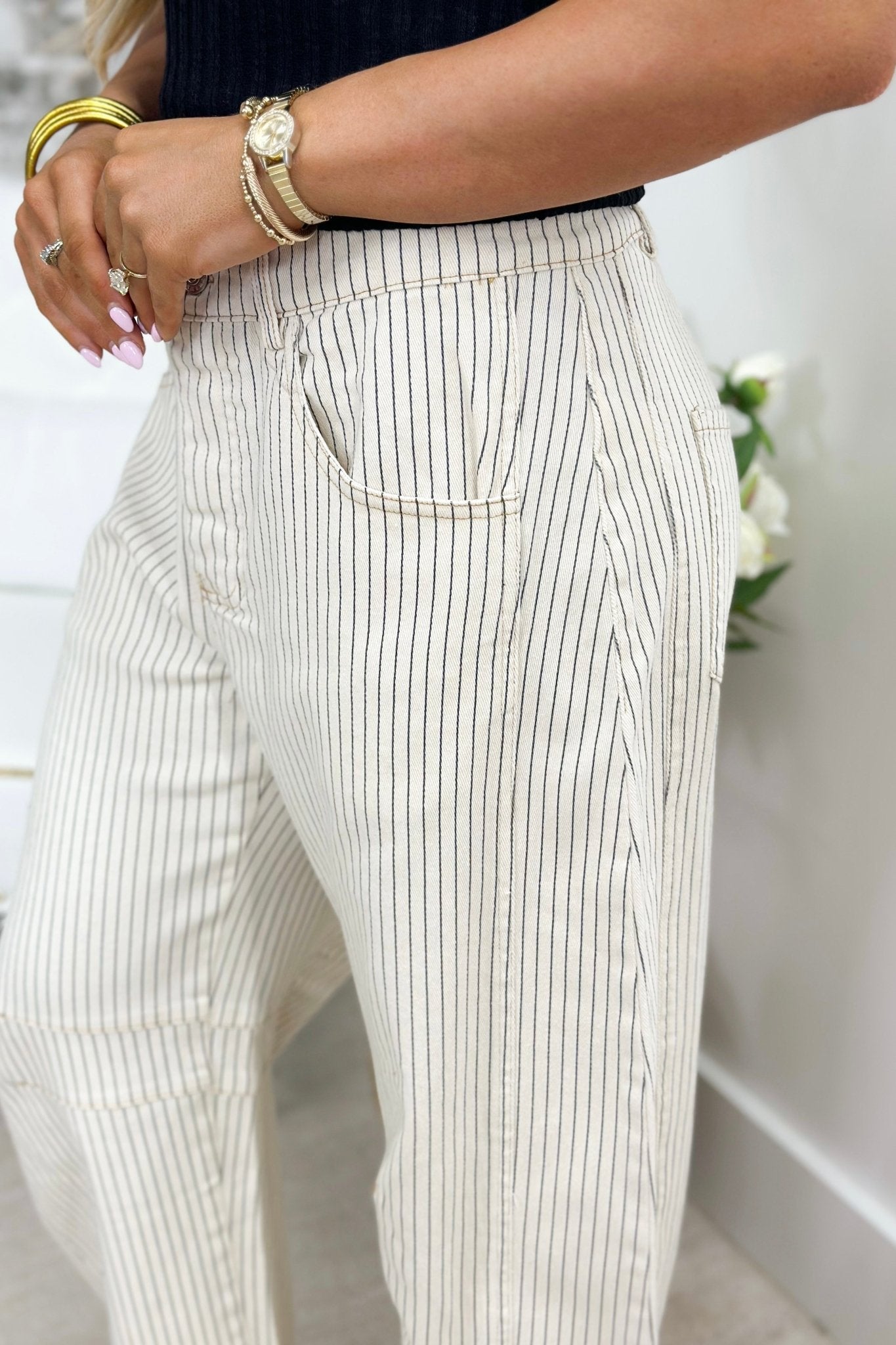 Striped barrel leg pants in off white