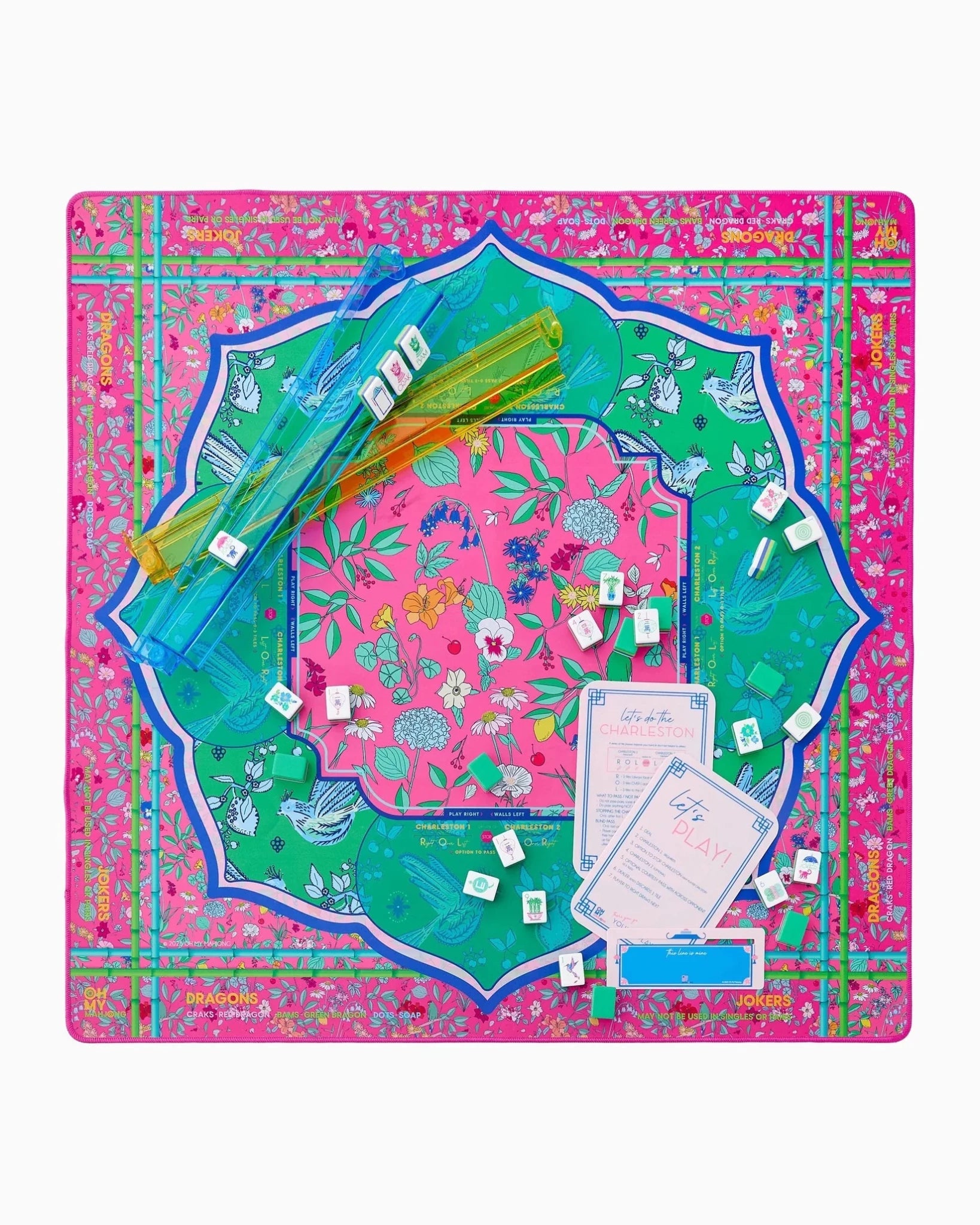 Enchanted print mahjong mat with its storage tube
