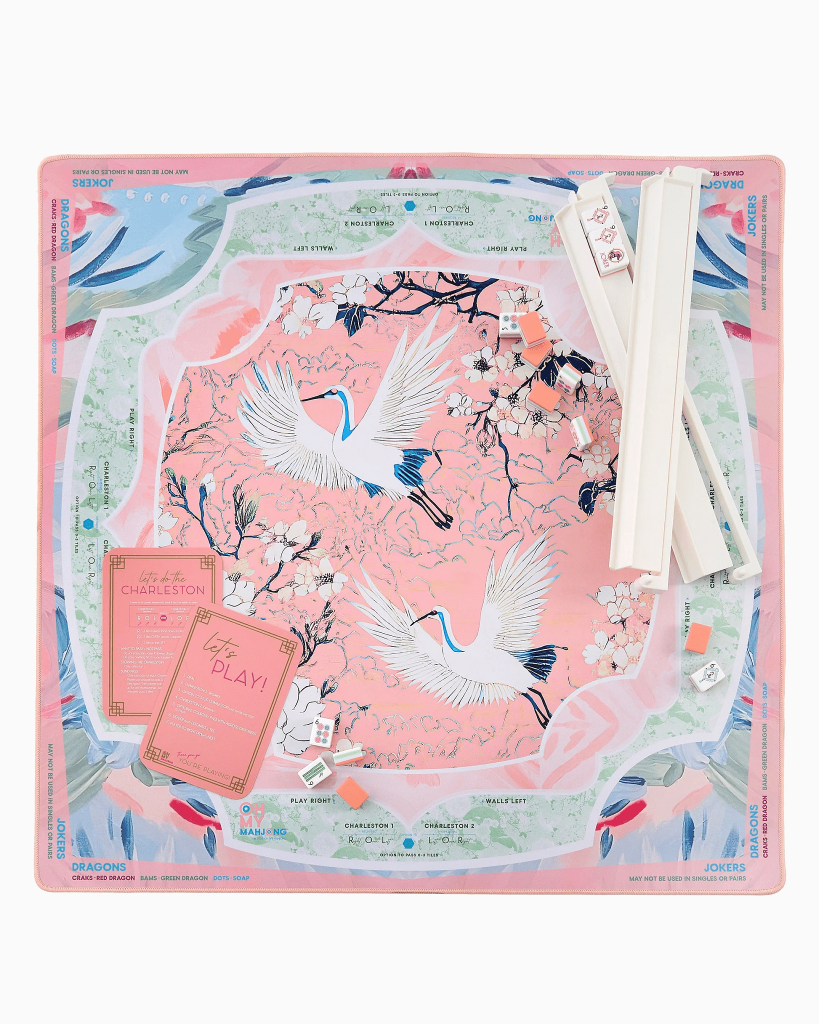 Heron print mahjong mat with its storage tube