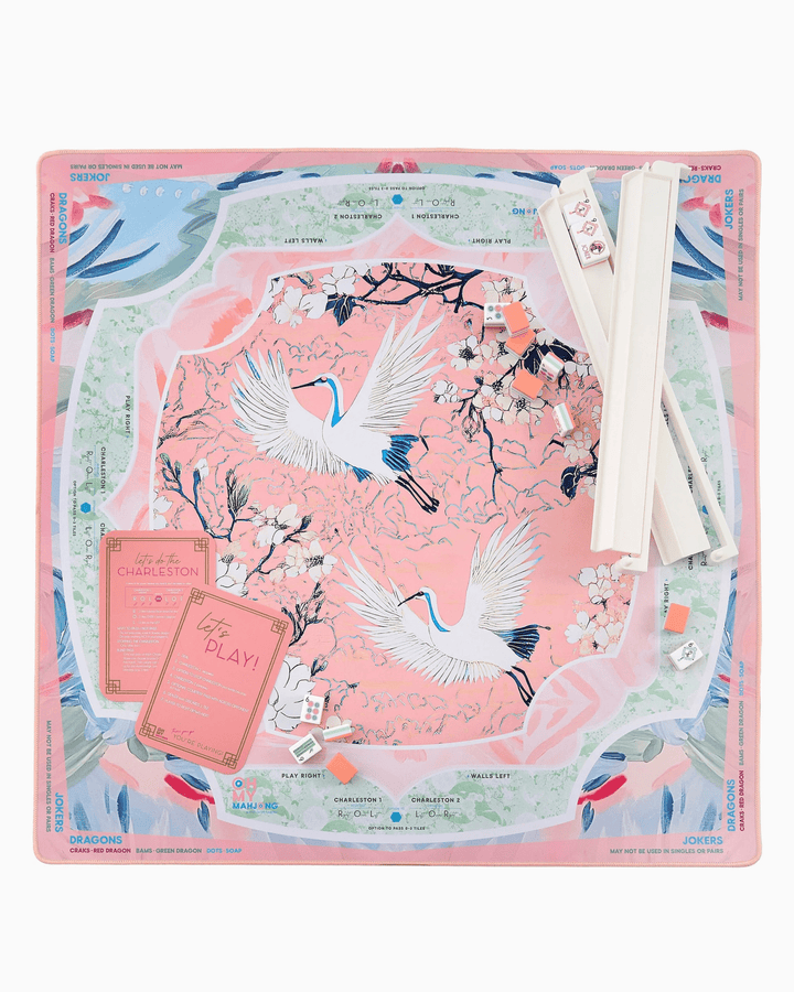 Heron print mahjong mat with its storage tube