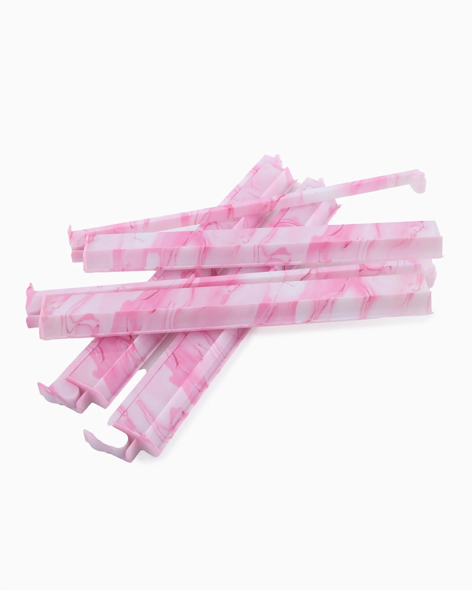 Mahjong tile racks with pushers in a pink quartz pattern