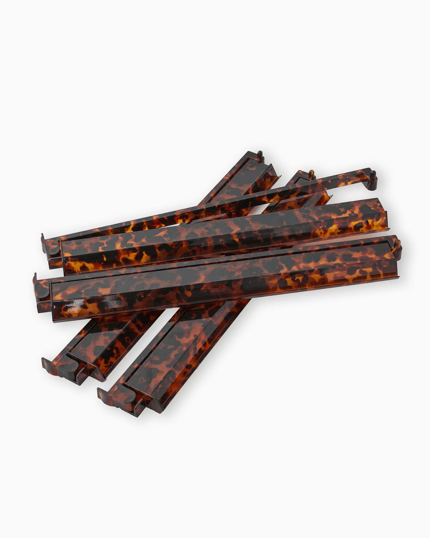 Mahjong tile racks with pushers in a tortoise shell finish