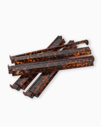 Mahjong tile racks with pushers in a tortoise shell finish