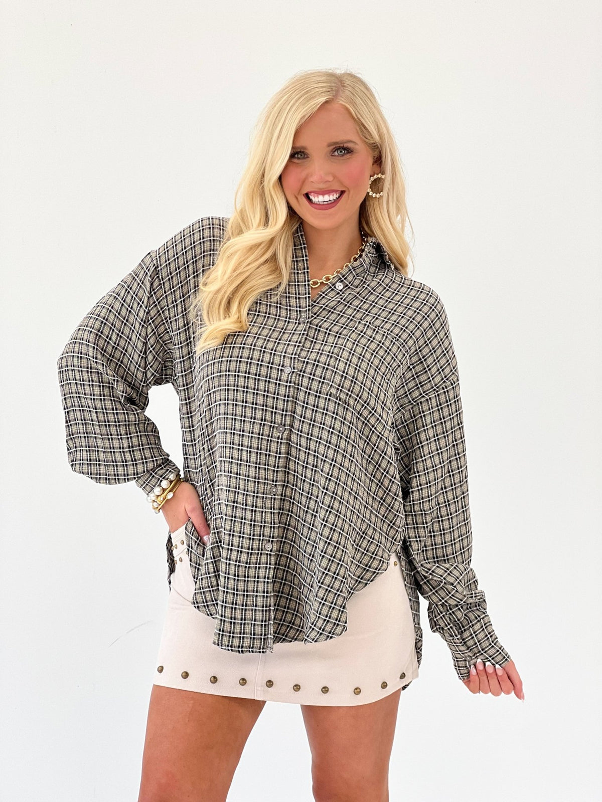 Plaid button up with long sleeves and a pointed collar