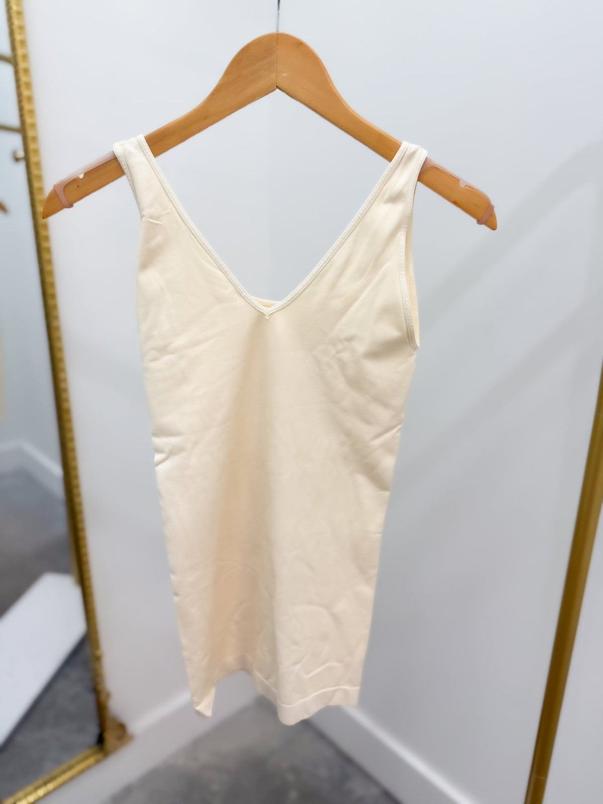 One size tank with a reversible neckline