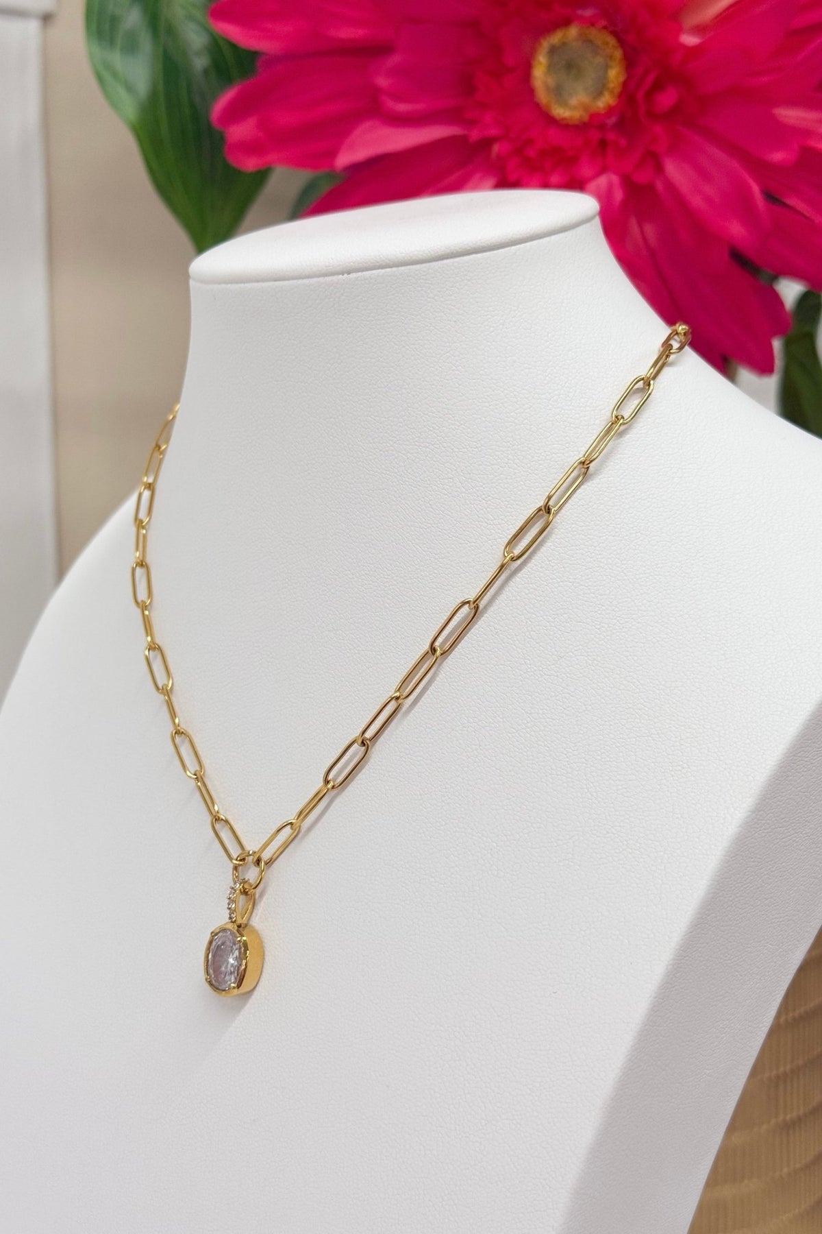 Gold paperclip links set with clear stones