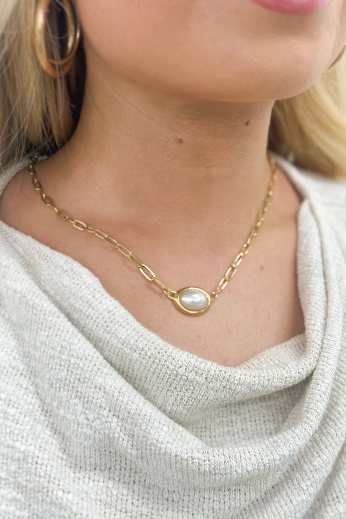 Oval pearl necklace on a paperclip chain